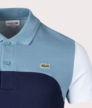 Colourblock polo shirt by Lacoste. Shot at EQVVS.  Detail shot. 