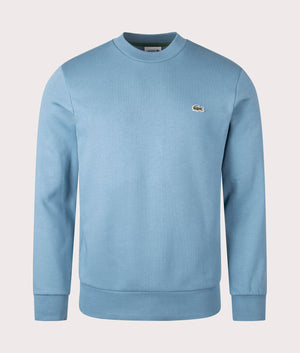 Lacoste Lacoste Relaxed Organic Brushed Cotton Sweatshirt in Limestone Blue. EQVVS front shot.