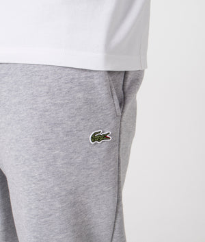 Lacoste Brushed Fleece Joggers in Silver Chine. Shot at EQVVS.  Detail shot. 