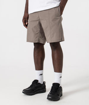 Swim Shorts in Light Taupe by Ami. EQVVS Side Angle Shot.