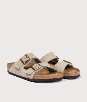 Arizona Suede Leather Sandals in Taupe by Birkenstock. EQVVS Shot.