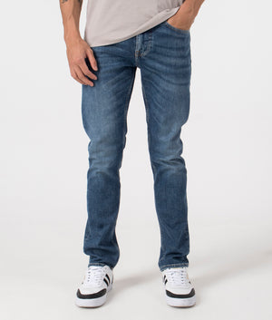 BOSS Slim Fit Delaware Comfort Stretch Jeans in Dark Blue. Front angle shot at EQVVS.