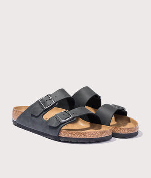 Arizona Oiled Leather Sandals in Black by Birkenstock. EQVVS Shot.