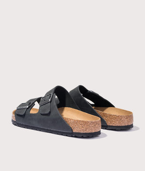 Arizona Oiled Leather Sandals in Black by Birkenstock. EQVVS Shot.