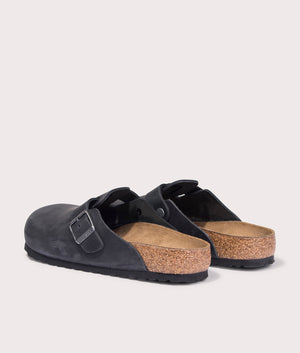 Boston Oiled Leather Clogs in Black by Birkenstock. EQVVS Shot.