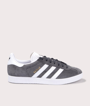 adidas Originals Gazelle trainers in Dark Grey/White/Gold Metallic, leather and suede upper. Side solo shot. 