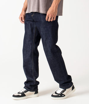 Carhartt WIP Relaxed Fit Marlow Jeans in blue rinsed, 100% Cotton 'Edgewood' Denim, EQVVS Menswear, side photo shot