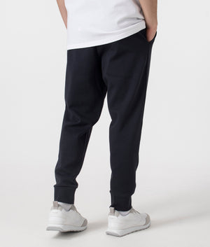 Navy blue Hadiko Joggers by BOSS. Reverse shot. Shot at EQVVS. 