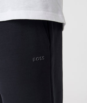 Navy blue Hadiko Joggers by BOSS. Detail shot. Shot at EQVVS. 