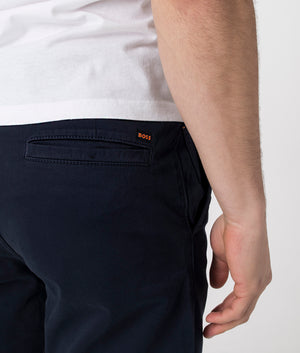 Tapered Fit Chino BOSS in navy blue. Detail shot. Shot at EQVVS. 