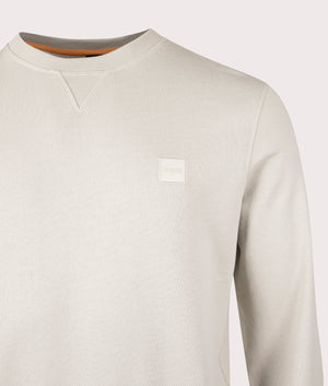 Westart Sweatshirt in Light Beige by BOSS. Shot at EQVVS. Detail shot. 