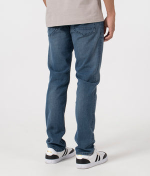 BOSS Slim Fit Delaware BC-C Jeans in Medium Blue. Back angle model shot at EQVVS.