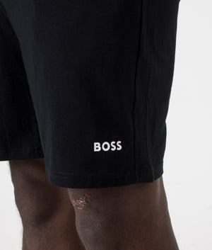 Lightweight Unique Shorts in Black by BOSS. EQVVS Model Shot.