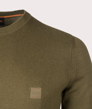 Kanovano Jumper in Open Green from BOSS. Detail angle shot at EQVVS.