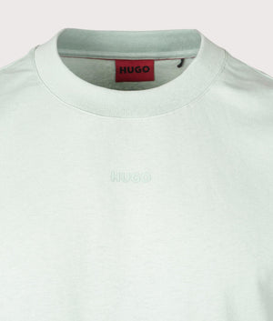 HUGO Relaxed Fit Dapolino T-Shirt in Light/Pastel Green. Detail angle shot at EQVVS.