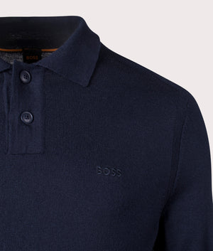 Avac Knitted Polo Shirt in Dark Blue from BOSS. Detail angle shot at EQVVS.