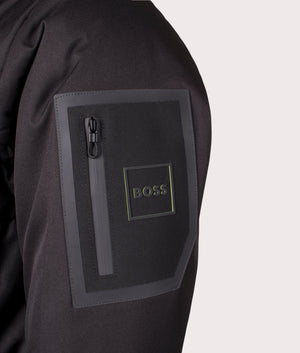 BOSS J Hamar 4 Puffer Jacket in Black, 100% Polyester. Detail Shot at EQVVS