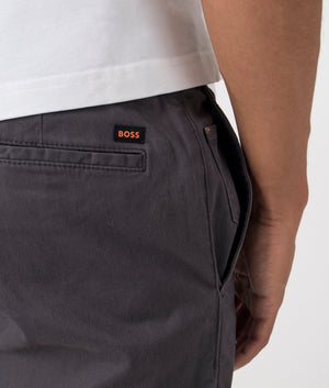 BOSS Chino Tapered Pants in Grey. Shot at EQVVS.  Detail Shot.