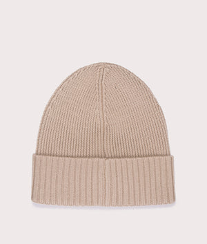 BOSS Flavio Beanie in Light Beige. 100% responsible source Virgin wool. At  EQVVS Menswear. back logo shot.