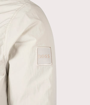 BOSS Oversized Locky 2 Overshirt in Light Beige. EQVVS Detail shot.