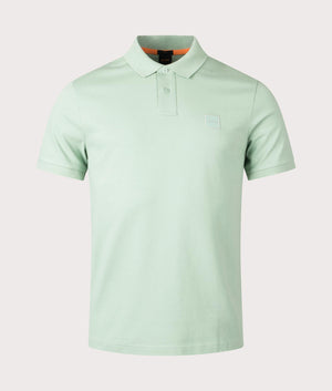 Slim fit Passenger Polo Shirt by BOSS. Light Pastel Green. Shot at EQVVS. Front shot. 