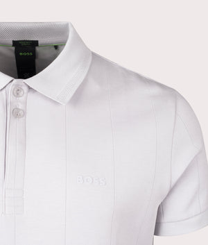 Paddy DropNeedle Polo Shirt in Light/Pastel Grey from BOSS. Detail angle shot at EQVVS.