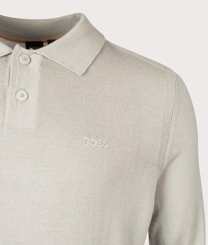 BOSS Avac Knitted Polo Shirt in Light Beige. At EQVVS Menswear. Front logo shot