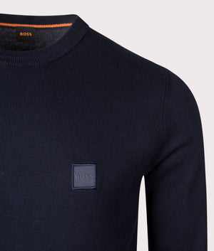 BOSS Kanovano Knitted Jumper in Dark Blue, Cotton/Cashmere Blend. At EQVVS Menswear. Front logo shot