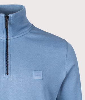 Quarter Zip Zetrust Sweatshirt in blue by BOSS. Shot at EQVVS. Detail shot. 