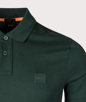 Detail shot. Open Green Passenger Polo Shirt by BOSS. Shot at EQVVS. 