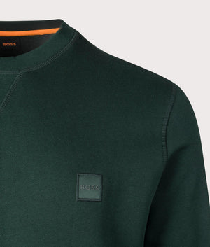 Relaxed  Fit Westart Sweatshirt in Open Green from BOSS. Detail angle shot at EQVVS.