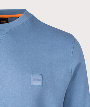 Relaxed  Fit Westart Sweatshirt in Light/Pastel Blue from BOSS. Detail angle shot at EQVVS.