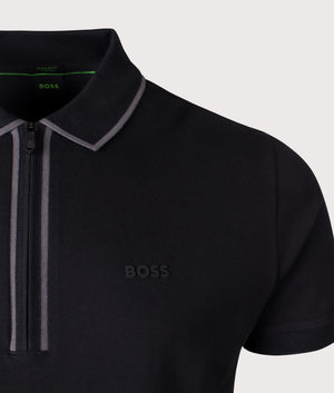 BOSS Philix Tape Polo Shirt in Black. Shot at EQVVS. Front logo shot