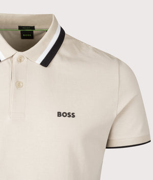 BOSS Paddy  Heritage Active Polo Shirt in Open Beige, 100% Cotton. At EQVVS Menswear. Front logo shot