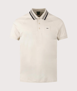 BOSS Paddy Rib Polo Shirt in Open Beige. Shot at EQVVS. Front detail shot