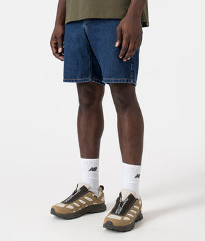 Newell Denim Short in Medium Wash by Carhartt. EQVVS Side Model Shot