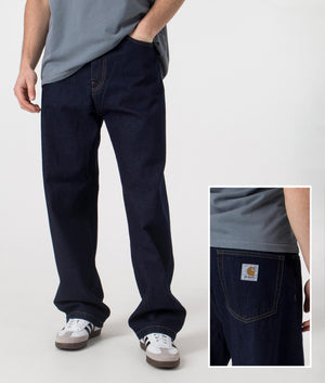 Carhartt WIP Landon Pants in dark blue. Shot at EQVVS, front shot. 