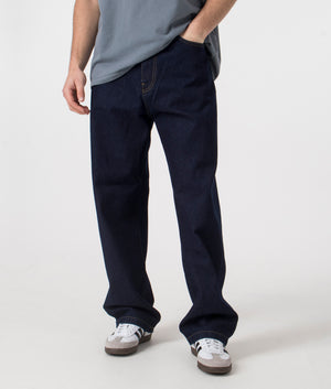 Carhartt WIP Landon Pants in dark blue. Shot at EQVVS, front shot. 