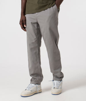 Flint Pant in Misty Grey by Carhartt WIP. EQVVS Side Angle Shot.