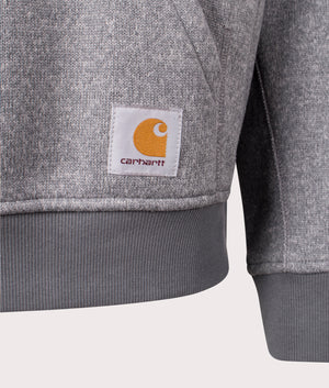 Carhartt WIP Luther Half-zip in Misty Heather Grey at EQVVS. Logo detail shot.