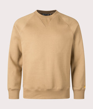 Carhartt WIP Chase Sweatshirt in Peanut/Gold. Front angle shot at EQVVS.