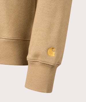 Carhartt WIP Chase Sweatshirt in Peanut/Gold. Detail angle shot at EQVVS.