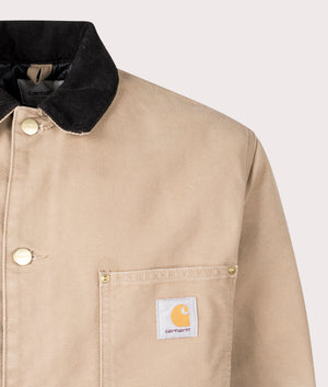 Carhartt OG Chore Coat in Peanut colourway, 100% cotton.Detailed logo shot. 