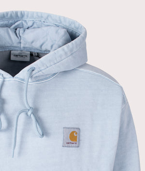 Carhartt WIP Oversized Vista Hoodie in Dusty Ice, 100% Cotton at EQVVS. Detailed logo shot. 