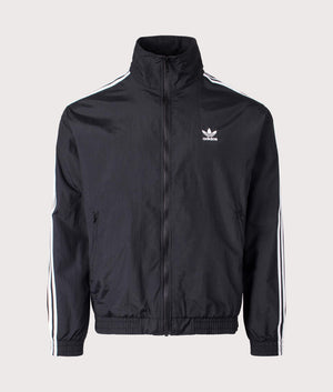 Relaxed Fit Adicolor Classics Firebird Track Top in Black by Adidas Originals at EQVVS. Front Angle Shot. 