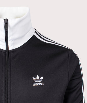 Adidas Originals Slim Fit Adicolor Classics Beckenbauer Track Top in Black/White. Shot at EQVVS. Front logo shot 