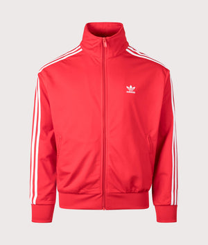 Relaxed Fit Adicolor Classics Firebird Track Top in Better Scarlet by adidas Originals at EQVVS. Front Angle Shot. 