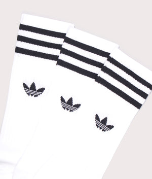 adidas Originals High Crew Socks in white at EQVVS. Detailed logo shot. 