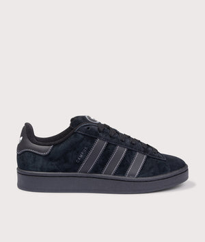 Campus 00s Trainers in Core Black by adidas Originals at EQVVS. Side Angle Shot.