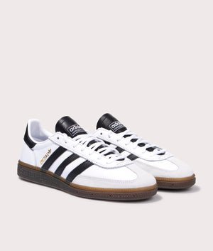 adidas Originals handball spezial trainers in Footwear White/Core Black/Gum 5 at EQVVS. Front pair shot. 